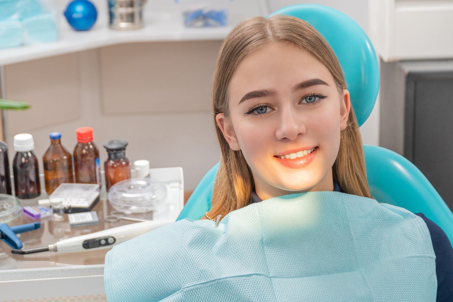 portrait of girl patient in dental chair
