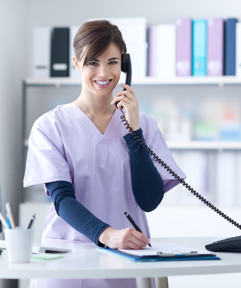 smiling receptionist at the clinic