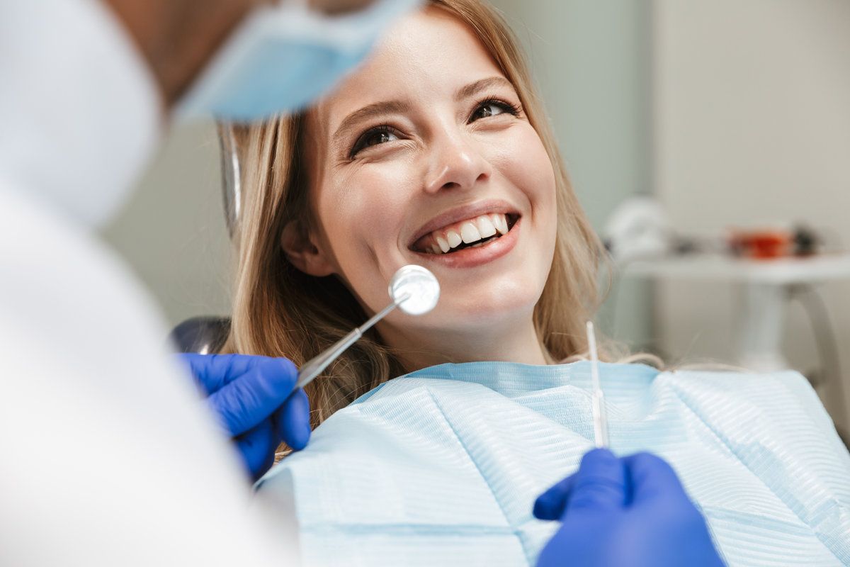 Patient smiling during dental check-up