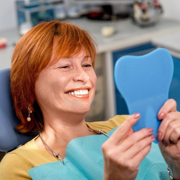 Smiling woman admiring her teeth